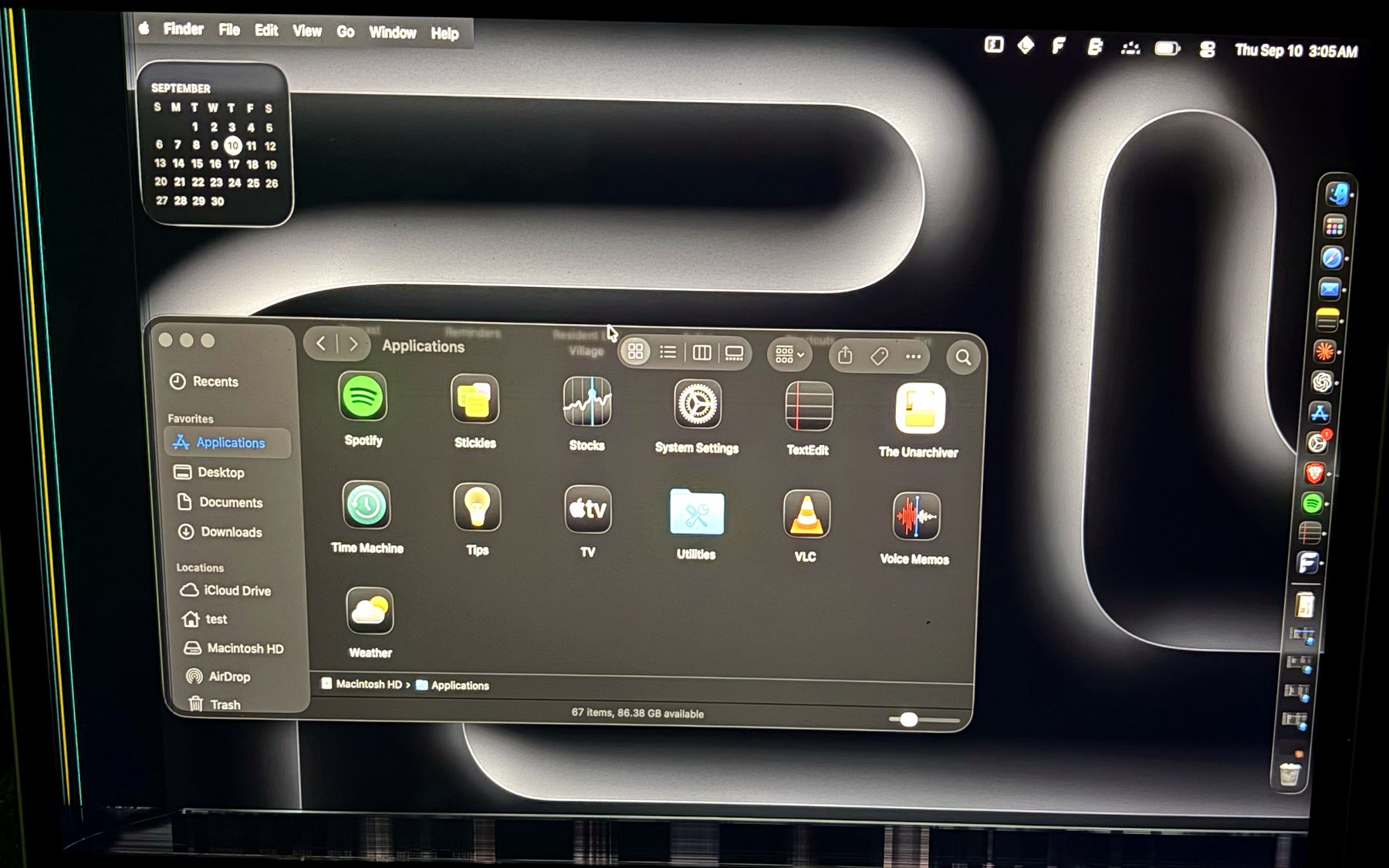 The mirrored menu bar in use, with the Apple menu clear of the damaged area.